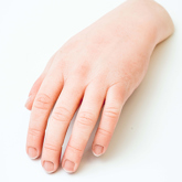 Close up of Silicone hand prosthesis with a white skin tone
