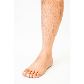 Front view of Silicone leg prosthesis with realistic hair detailing with a white skin tone