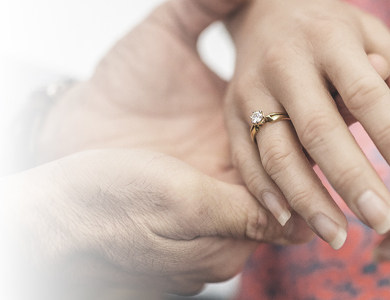 Natural-Looking Silicone Hand Prosthesis Close-up of hands holding a silicone hand prosthesis wearing a gold ring